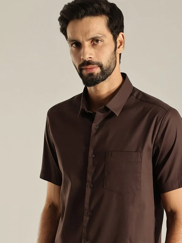 Men Solid Half Sleeve Cotton Blend Shirt